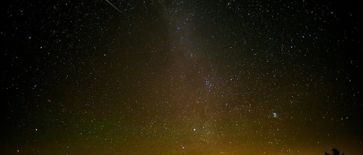 Cover illustration for Perseid Meteor Shower 2026: Peak Date, Time, and Tips
